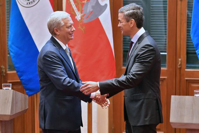 Chile's President Jose Antonio Kast (L) and Paraguay's President Santiago Pena (R) shake hands after a joint press conference in Asuncion on July 1, 2026. (Photo by DANIEL DUARTE / AFP)