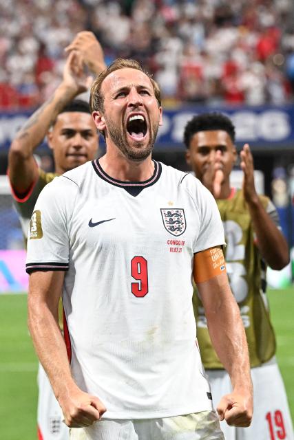 England's forward #09 Harry Kane celebrates after winning the 2026 World Cup round of 32 match football between England and the Democratic Republic of Congo at the Atlanta Stadium in Atlanta on July 1, 2026.  (Photo by ROBERTO SCHMIDT / AFP)