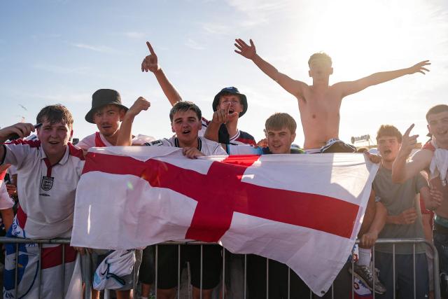 England supporters celebrate the team's victory after watching the 2026 World Cup round-of-32 football match between England and the Democratic Republic of Congo, at the 4TheFans Fan Park in Brighton, southern England on July 1, 2026. (Photo by CARLOS JASSO / AFP)