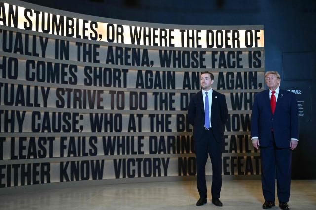 US President Donald Trump visits the "Man in the Arena" speech exhibit with Robbie Lauf (L), Executive Director of the Theodore Roosevelt Presidential Library, as he tours the Theodore Roosevelt Presidential Library in Medora, North Dakota, on July 1, 2026. . (Photo by SAUL LOEB / AFP)