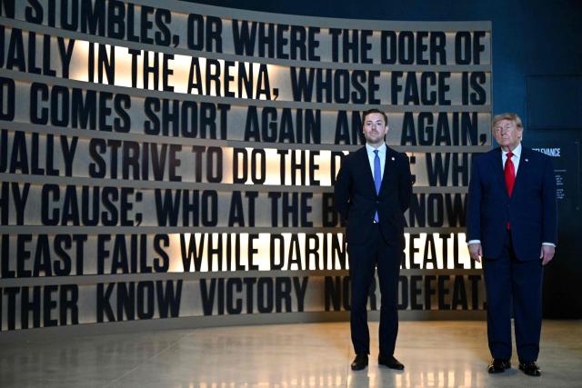 US President Donald Trump visits the "Man in the Arena" speech exhibit with Robbie Lauf (L), Executive Director of the Theodore Roosevelt Presidential Library, as he tours the Theodore Roosevelt Presidential Library in Medora, North Dakota, on July 1, 2026. . (Photo by SAUL LOEB / AFP)