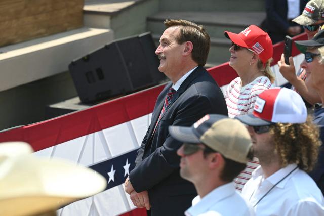 CEO of My Pillow Mike Lindell listens as the US president speaks at the Burning Hills Amphitheatre in Medora, North Dakota, on July 1, 2026. (Photo by SAUL LOEB / AFP)