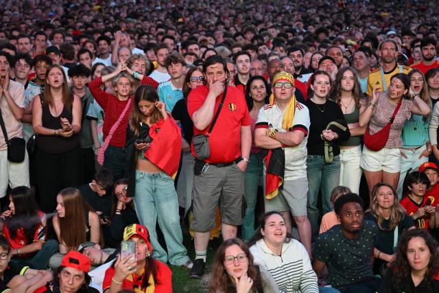 Belgium supporters react as they watch the 2026 World Cup round of 32 football match between Belgium and Senegal at a fan park in Uccle, southern Brussels, on July 1, 2026. (Photo by Nicolas TUCAT / AFP)