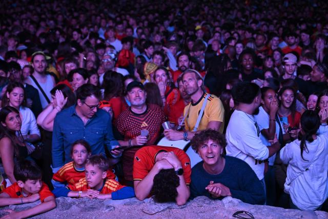 Belgium supporters react as they watch the 2026 World Cup round of 32 football match between Belgium and Senegal at a fan park in Uccle, southern Brussels, on July 1, 2026. (Photo by Nicolas TUCAT / AFP)