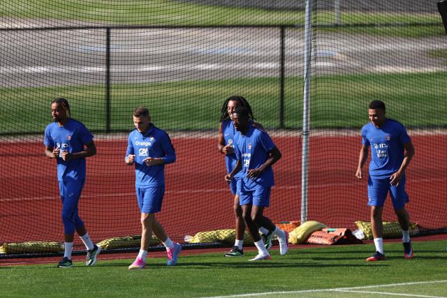 (L-R) France's forward #12 Bradley Barcola, defender #03 Lucas Digne, defender #05 Jules Kounde, forward #07 Ousmane Dembele, and forward #10 Kylian Mbappe take part in a training session at Bentley University in Waltham, near Boston, on July 1, 2026, during the 2026 World Cup football tournament. (Photo by FRANCK FIFE / AFP)