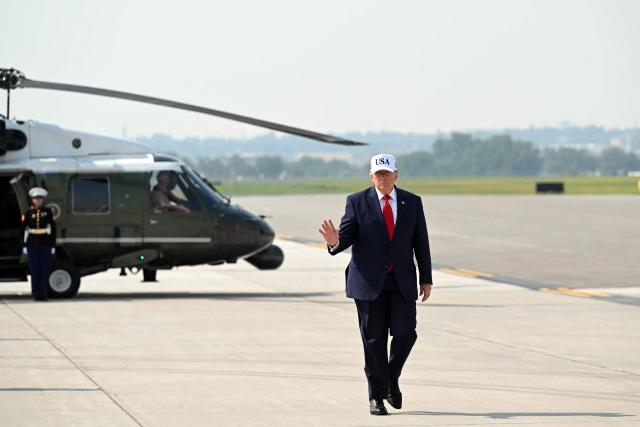 US President Donald Trump walks to board Air Force One prior to his departure from Bismarck Municipal Airport in Bismarck, North Dakota, July 1, 2026, following his visit to attend the grand opening of the Theodore Roosevelt Presidential Library. President Trump is on his first trip aboard the Boeing 747-8 that Qatar gifted the United States to use for executive travel. (Photo by SAUL LOEB / AFP)