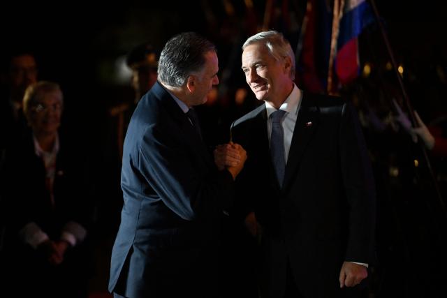 Chile's President Jose Antonio Kast (R) is greeted by Uruguay's President Yamandu Orsi upon arrival for a meeting at the Suarez residency in Montevideo on July 1, 2026. (Photo by Santiago Mazzarovich / AFP)