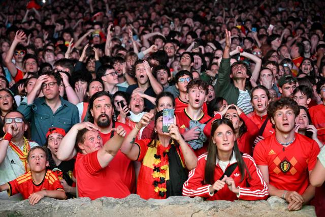 Belgium supporters react as they watch the 2026 World Cup round of 32 football match between Belgium and Senegal at a fan park in Uccle, southern Brussels, on July 1, 2026. (Photo by Nicolas TUCAT / AFP)