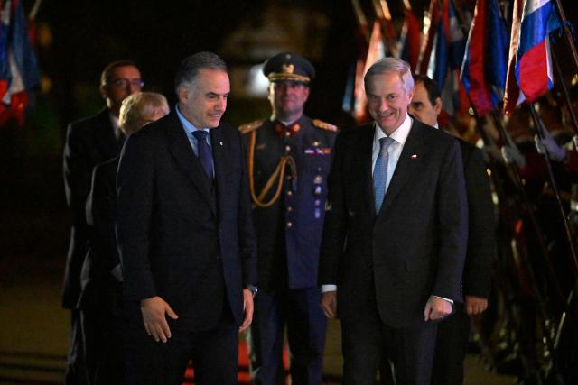 Chile's President Jose Antonio Kast (R) is greeted by Uruguay's President Yamandu Orsi upon arrival for a meeting at the Suarez residency in Montevideo on July 1, 2026. (Photo by Santiago Mazzarovich / AFP)
