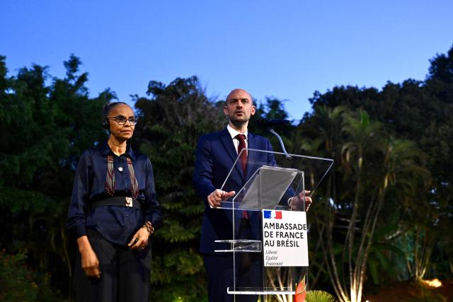 French Foreign Minister Jean-Noel Barrot speaks as he awards former Brazilian Environment Minister Marina Silva with the Legion of Honor during a ceremony at the French Embassy in Brasilia on July 1, 2026. (Photo by Evaristo Sa / AFP)