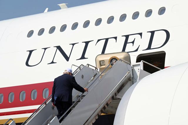 US President Donald Trump boards Air Force One prior to his departure from Bismarck Municipal Airport in Bismarck, North Dakota, July 1, 2026, following his visit to attend the grand opening of the Theodore Roosevelt Presidential Library. President Trump is on his first trip aboard the Boeing 747-8 that Qatar gifted the United States to use for executive travel. (Photo by SAUL LOEB / AFP)