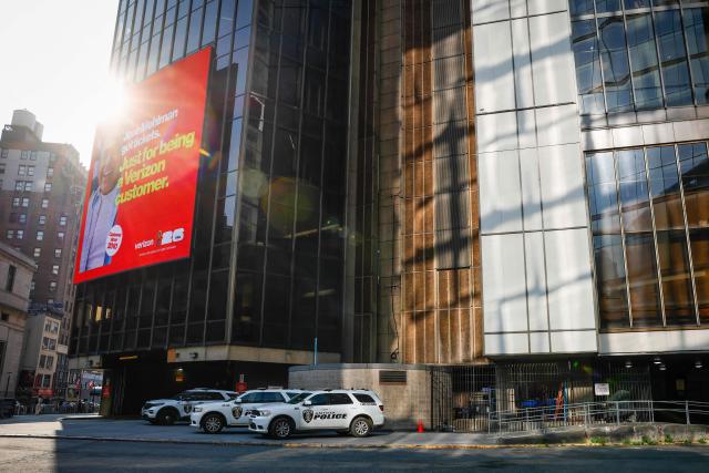 Police cruisers of the passenger railroad company Amtrak are parked outside Madison Square Garden in New York on July 1, 2026. Increasing signs point to a mega-bash for the A-list celebrity couple Taylor Swift and Travis Kelce at Madison Square Garden this week. Rumors have run rampant for weeks that the 36-year-old pop superstar and the three-time NFL Super Bowl winner, both 36, could wed at the storied sports arena, home to the New York Knicks, the newly crowned NBA champions. (Photo by kena betancur / AFP)