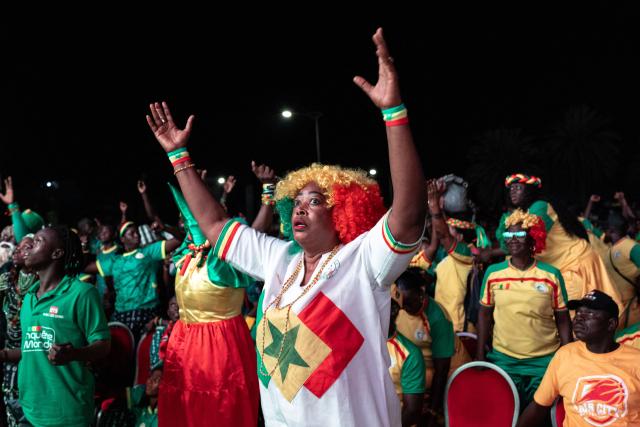 Senegal supporters react as they watch the 2026 World Cup round of 32 football match between Belgium and Senegal at the FIFA Fan Zone at the Place de l'Obelisque in Dakar on July 1, 2026. (Photo by Patrick meinhardt / AFP)