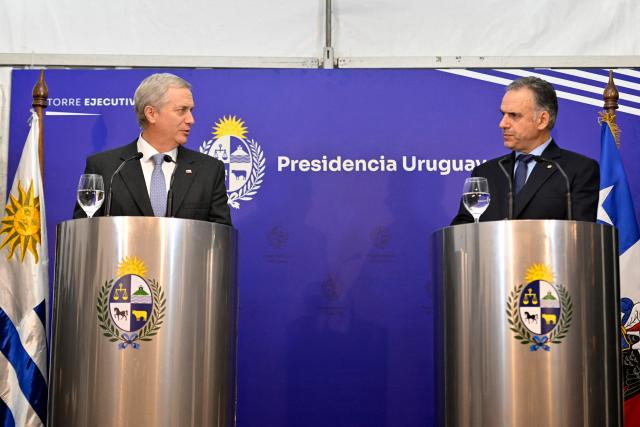 Chile's President Jose Antonio Kast (L) speaks next to Uruguay's President Yamandu Orsi during a meeting at the Suarez residency in Montevideo on July 1, 2026. (Photo by Santiago Mazzarovich / AFP)