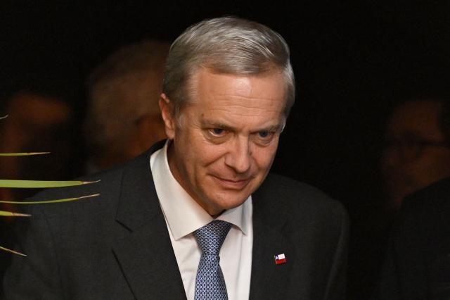 Chile's President Jose Antonio Kast arrives for a meeting with Uruguay's President Yamandu Orsi at the Suarez Residency in Montevideo on July 1, 2026. (Photo by Santiago Mazzarovich / AFP)