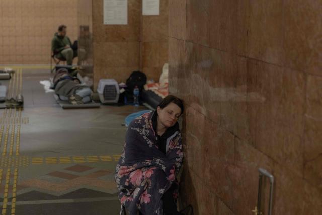 People take shelter at a metro station during Russian air attacks on Kyiv, early on July 2, 2026, amid the Russian invasion of Ukraine. AFP journalists in the central and eastern districts of Kyiv heard more than a dozen explosions, as the city's Mayor Vitali Klitschko said on Telegram that "Kyiv is under attack from ballistic missiles and UAVs". (Photo by Roman PILIPEY / AFP)