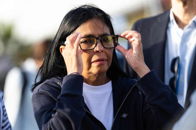 Venezuela's interim President Delcy Rodriguez gestures as she visits a temporary camp of the French Civil Security in La Guaira, La Guaira state, on July 1, 2026, following the June 24 twin earthquakes in Venezuela. Hope of finding more survivors faded on July 1 as Venezuela marked a week since twin earthquakes killed almost 2,300 people, while many who lived through the disaster were running desperately short on food. (Photo by Miguel MEDINA / POOL / AFP)