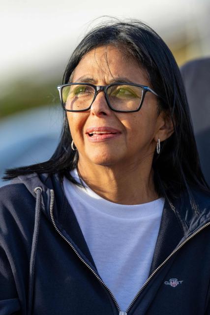 Venezuela's interim President Delcy Rodriguez looks on as she visits a temporary camp of the French Civil Security in La Guaira, La Guaira state, on July 1, 2026, following the June 24 twin earthquakes in Venezuela. Hope of finding more survivors faded on July 1 as Venezuela marked a week since twin earthquakes killed almost 2,300 people, while many who lived through the disaster were running desperately short on food. (Photo by Miguel MEDINA / POOL / AFP)