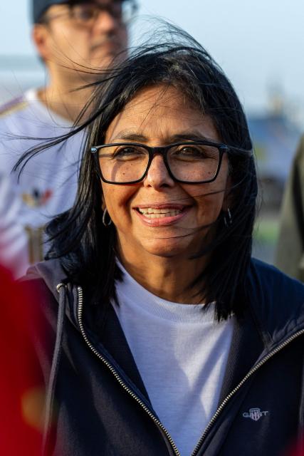 Venezuela's interim President Delcy Rodriguez gestures as she visits a temporary camp of the French Civil Security in La Guaira, La Guaira state, on July 1, 2026, following the June 24 twin earthquakes in Venezuela. Hope of finding more survivors faded on July 1 as Venezuela marked a week since twin earthquakes killed almost 2,300 people, while many who lived through the disaster were running desperately short on food. (Photo by Miguel MEDINA / POOL / AFP)