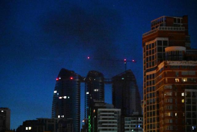 Smoke rises during a Russian missile strike on the Ukrainian capital Kyiv on July 2, 2026, amid the Russian invasion in Ukraine. Russian missile and drone strikes rocked Kyiv early on July 2, setting off fires and wounding at least five people, after President Volodymyr Zelensky warned that Moscow was preparing a "massive attack". (Photo by Sergei SUPINSKY / AFP)