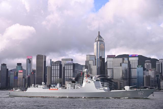 The Chinese People's Liberation Army (PLA) Navy guided-missile destroyer Nanning (162) sails through Victoria Harbour during its arrival in Hong Kong for a five-day visit on July 2, 2026. (Photo by Peter PARKS / AFP)
