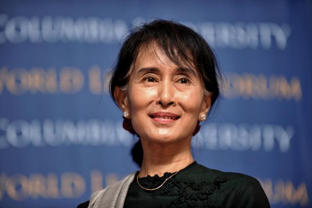 (FILES) Aung San Suu Kyi, Myanmar Member of Parliament, speaks at the Low Memorial Library at Columbia University in New York on September 22, 2012. Myanmar's deposed leader is under house arrest in the capital Naypyidaw, according to her captors, but experts say the city is purpose built to guard secrets of the country's closed-ranks rulers. (Photo by STAN HONDA / AFP)
