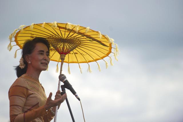 (FILES) National League for Democracy chairperson, Aung San Suu Kyi delivers a speech during a voter education campaign at the Hsiseng township in Shan State, on September 5, 2015. Myanmar's deposed leader is under house arrest in the capital Naypyidaw, according to her captors, but experts say the city is purpose built to guard secrets of the country's closed-ranks rulers. (Photo by AFP)