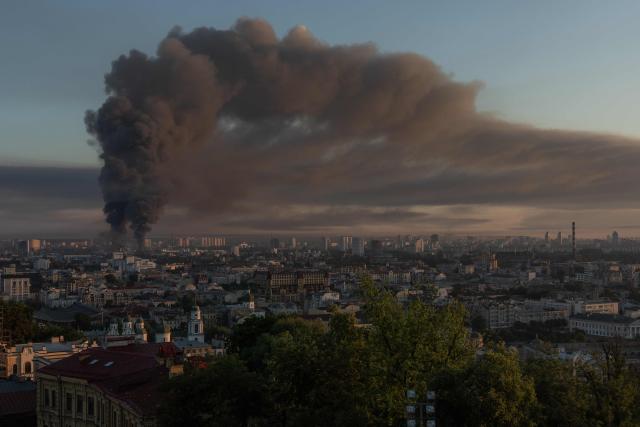 Smoke rises over the city following a Russian air attack on Kyiv, on July 2, 2026, amid the Russian invasion of Ukraine. Russian missile and drone strikes rocked Kyiv early on July 2, killing two people and wounding more than a dozen, after President Volodymyr Zelensky warned that Moscow was preparing a "massive attack". (Photo by Roman PILIPEY / AFP)