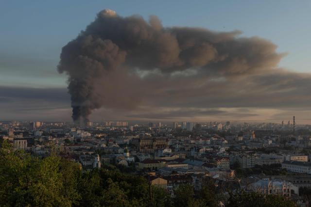 Smoke rises over the city following a Russian air attack on Kyiv, on July 2, 2026, amid the Russian invasion of Ukraine. Russian missile and drone strikes rocked Kyiv early on July 2, killing two people and wounding more than a dozen, after President Volodymyr Zelensky warned that Moscow was preparing a "massive attack". (Photo by Roman PILIPEY / AFP)