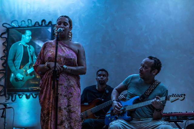 Cape Verdean singer Ceuzany Pires sings next to composer and guitarist Hernani Almeida during a concert at a bar in Mindelo, on May 26, 2026. Barefoot, arms raised to the sky and overcome with emotion, Ceuzany delivers with her powerful voice the flagship song from her latest album dedicated to the fight against domestic violence, sending shivers through the audience packed into a bar in Mindelo, on the island of Sгo Vicente.
She is compared to the great Cesбria Йvora, the “barefoot diva” who introduced two traditional Cape Verdean music genres to the world: morna (soft, nostalgic melodies) and coladeira (faster-paced rhythm). (Photo by PATRICK MEINHARDT / AFP)