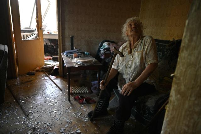 Local resident Valentina, 86, sits in her flat in a damaged residential building following missile strikes on the Ukrainian capital of Kyiv on July 2, 2026, amid the Russian invasion in Ukraine. Russian missile and drone strikes rocked Kyiv early on July 2, killing at least eight people and wounding dozens, after President Volodymyr Zelensky warned that Moscow was preparing a "massive attack". (Photo by Genya Savilov / AFP)