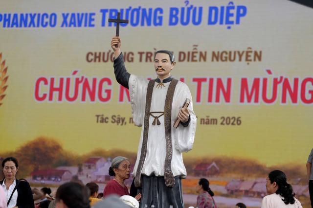 A statue of the late priest Francis Xavier Truong Buu Diep is pictured at his beatification mass at the Tac Say Pilgrimage Center in Ca Mau province in southern Vietnam on July 2, 2026. Tens of thousands of Catholics flocked to a small parish in the Mekong Delta on July 2 for the first beatification ceremony held on Vietnamese soil, with an envoy of Pope Leo XIV presiding over the special mass. (Photo by AFP)