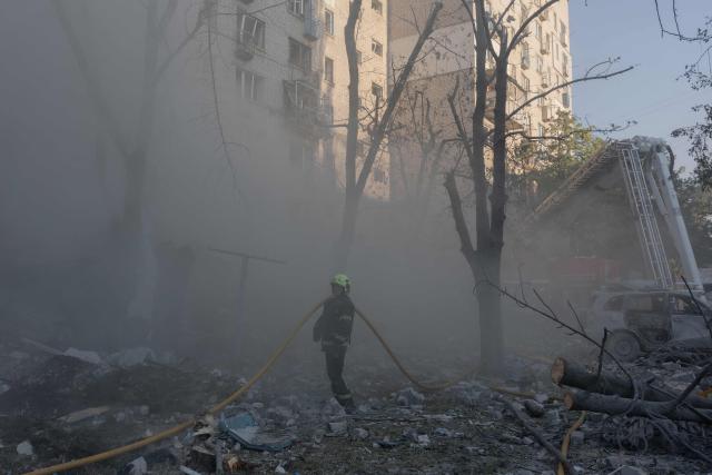 A firefighter works at the site of a residential building damaged following a Russian air attack on the Ukrainian capital of Kyiv on July 2, 2026, amid the Russian invasion in Ukraine. Russian missile and drone strikes rocked Kyiv early on July 2, killing at least eight people and wounding dozens, after President Volodymyr Zelensky warned that Moscow was preparing a "massive attack". (Photo by Roman PILIPEY / AFP)