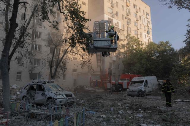 Ukrainian firefighters work at the site of a residential building damaged following a Russian air attack on the Ukrainian capital of Kyiv on July 2, 2026, amid the Russian invasion in Ukraine. Russian missile and drone strikes rocked Kyiv early on July 2, killing at least eight people and wounding dozens, after President Volodymyr Zelensky warned that Moscow was preparing a "massive attack". (Photo by Roman PILIPEY / AFP)