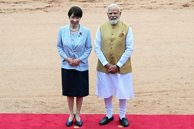India's Prime Minister Narendra Modi (R) stands with Japan's Prime Minister Sanae Takaichi during her ceremonial reception at India's presidential palace, Rashtrapati Bhavan, in New Delhi on July 2, 2026. (Photo by Sajjad HUSSAIN / AFP)
