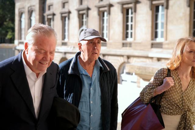 Dany Leprince (C) arrives with his lawyers Olivier Morice (L) and Missiva Chermak Felonneau (R) at Paris courthouse on July 2, 2026 ahead of the decision of the Court of Review reagarding his conviction for the 1994 murders of his brother, sister-in-law and two of their daughters in the Sarthe region of France. The Court of Review will consider the new request of Dany Leprince, sentenced to life imprisonment but who proclaims his innocence and is asking for a second trial, a new stage in the long legal saga of this famous criminal case of a quadruple murder in Sarthe in 1994. (Photo by Thomas SAMSON / AFP)
