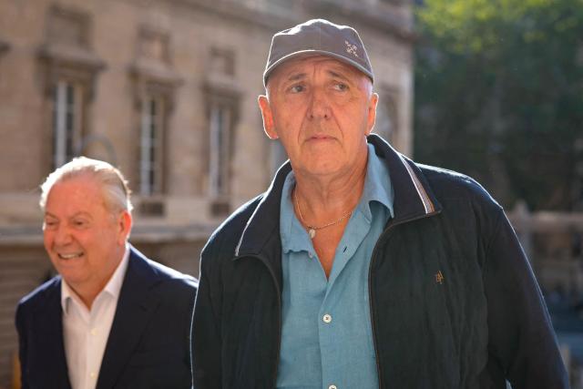 Dany Leprince (R) arrives with his lawyer Olivier Morice (L) at Paris courthouse on July 2, 2026 ahead of the decision of the Court of Review reagarding his conviction for the 1994 murders of his brother, sister-in-law and two of their daughters in the Sarthe region of France. The Court of Review will consider the new request of Dany Leprince, sentenced to life imprisonment but who proclaims his innocence and is asking for a second trial, a new stage in the long legal saga of this famous criminal case of a quadruple murder in Sarthe in 1994. (Photo by Thomas SAMSON / AFP)