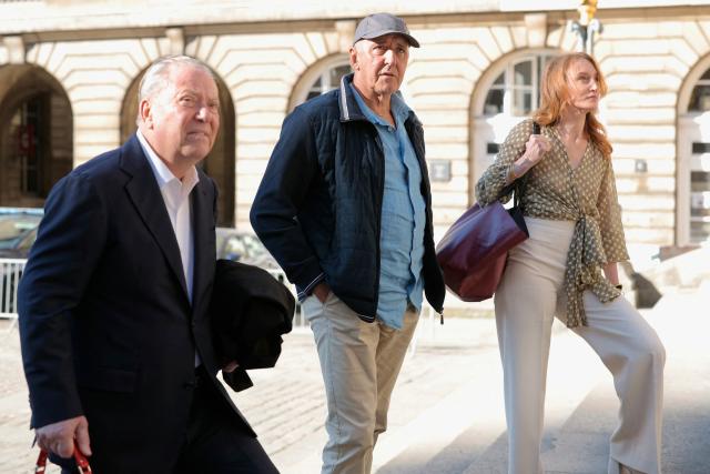 Dany Leprince (C) arrives with his lawyers Olivier Morice (L) and Missiva Chermak Felonneau (R) at Paris courthouse on July 2, 2026 ahead of the decision of the Court of Review reagarding his conviction for the 1994 murders of his brother, sister-in-law and two of their daughters in the Sarthe region of France. The Court of Review will consider the new request of Dany Leprince, sentenced to life imprisonment but who proclaims his innocence and is asking for a second trial, a new stage in the long legal saga of this famous criminal case of a quadruple murder in Sarthe in 1994. (Photo by Thomas SAMSON / AFP)
