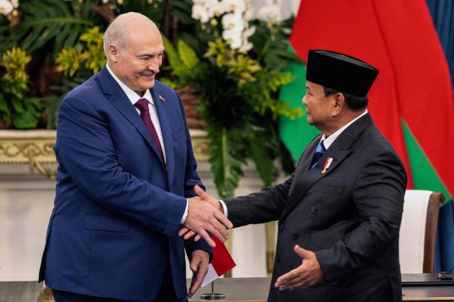 Indonesia's President Prabowo Subianto (R) and Belarus's President Alexander Lukashenko shake hands after attending a joint press conference at the Merdeka Palace in Jakarta on July 2, 2026. (Photo by YASUYOSHI CHIBA / AFP)