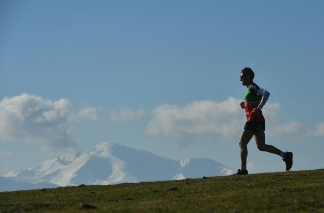 (FILES) French Basque trail runner Benat Marmissolle trains in the mountains near his home in Tardets-Sorholus, southwestern France on February 9, 2023. Eight years of "hell" during which his pursuit of "extreme thinness" led to serious eating disorders and "destroyed" his metabolism: Basque ultra-trail runner Benat Marmissolle, 45, warns the world of ultra-trail about the devastating impact of an unsuitable diet. After winning the Ultra-Trail Snowdonia in Wales in May, the Basque runner will start the UTMB in Chamonix at the end of August. (Photo by GAIZKA IROZ / AFP)