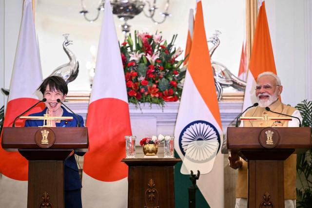 Japan's Prime Minister Sanae Takaichi (L) gestures as India's Prime Minister Narendra Modi looks on during joint press statements after their meeting at the Hyderabad House in New Delhi on July 2, 2026. (Photo by Sajjad HUSSAIN / AFP)