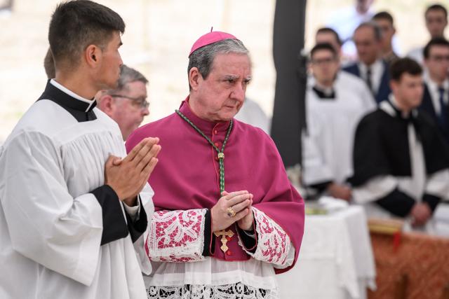 (FILES) Traditionalist Catholic Bishop of the Society of Saint Pius X (SSPX) Alfonso de Galarreta (C) attends an ordination ceremony of the traditionalist Catholic Society of Saint Pius X (SSPX), in Econe, western Switzerland, on June 29, 2026. The Vatican on July 2, 2026 excommunicated six bishops from the ultraconservative Society of St Pius X and said any lay believers who "formally adhere" to the group would suffer the same fate. The Vatican decree comes a day after the traditionalist breakaway group consecrated four new bishops, defying a plea from Pope Leo XIV not to do so. (Photo by Fabrice COFFRINI / AFP)