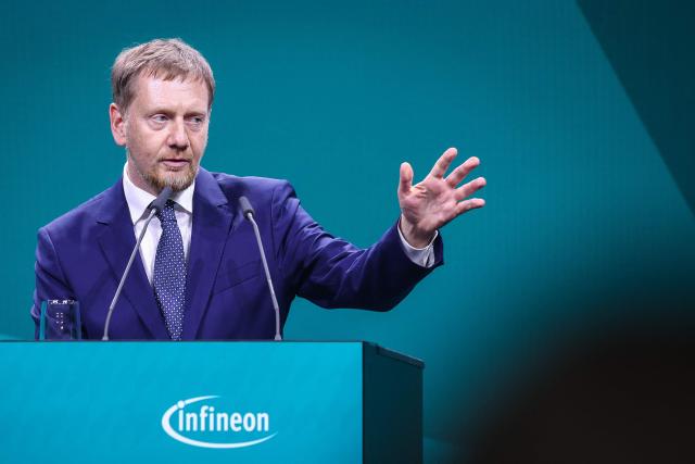 Saxony's State Premier Michael Kretschmer delivers his speech during the opening ceremony of the Infineon Smart Power Fab in Dresden, eastern Germany, on July 2, 2026. German semiconductor giant Infineon officially opens a large new chip factory in eastern Germany on July 2, three months ahead of schedule. The new, highly automated plant -- which cost 5 billion euros ($5.7 billion) -- has been repeatedly held up as a symbol of the European Union's push to bolster the domestic tech sector and reduce dependency for crucial parts on Asia and the United States. (Photo by Ronny HARTMANN / AFP)