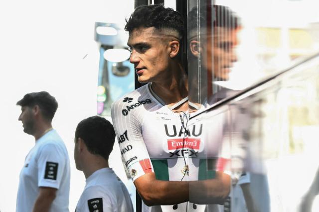 UAE Team Emirates - XRG team's Mexican rider Isaac Del Toro casts a reflection as he disembarks his team bus during a training session two days prior to the start of the 113th edition of the Tour de France cycling race, in Castelldefels near Barcelona in northeastern Spain, on July 2, 2026. (Photo by Jeff PACHOUD / AFP)