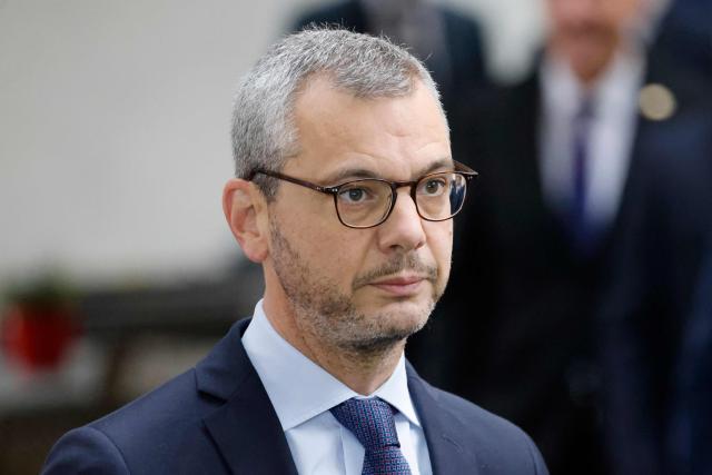 (FILES) Elysee Palace General Secretary Alexis Kohler looks on prior to the start of the second working session in Hamburg, northern Germany, on October 10, 2023, on the second day of two-day German-French government consultations. The Paris Court of Appeal ruled on July 2, 2026 that part of the allegations against France's President former right-hand man, Alexis Kohler, are time-barred, significantly narrowing the scope of the investigation into him for unlawful conflict of interest, AFP learned from sources close to the case. (Photo by Ludovic MARIN / AFP)