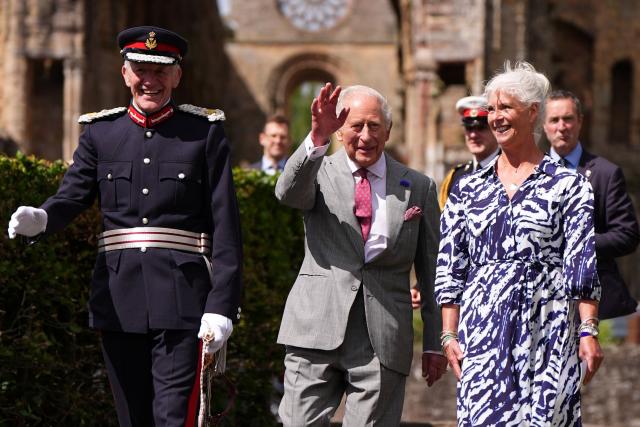 Britain's King Charles III (C) waves during a visit to coincide with the Jethart Callant Festival in Jedburgh, Scotland on July 2, 2026. (Photo by Aaron Chown / POOL / AFP)