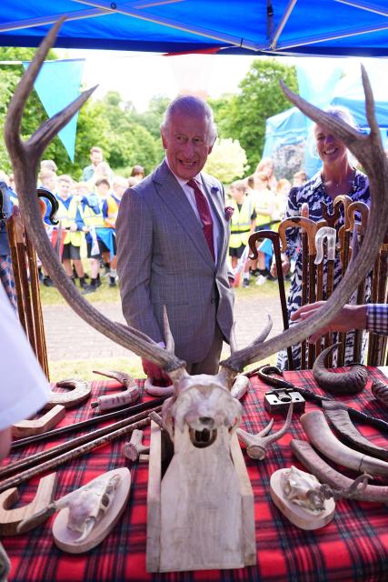 Britain's King Charles III views horns during a visit to coincide with the Jethart Callant Festival in Jedburgh, Scotland on July 2, 2026. (Photo by Aaron Chown / POOL / AFP)