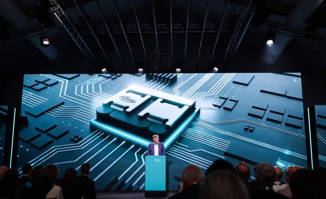 Jochen Hanebeck, CEO of Infineon, delivers his speech during the opening ceremony of the Infineon Smart Power Fab in Dresden, eastern Germany, on July 2, 2026. German semiconductor giant Infineon officially opens a large new chip factory in eastern Germany on July 2, three months ahead of schedule. The new, highly automated plant -- which cost 5 billion euros ($5.7 billion) -- has been repeatedly held up as a symbol of the European Union's push to bolster the domestic tech sector and reduce dependency for crucial parts on Asia and the United States. (Photo by Ronny HARTMANN / AFP)