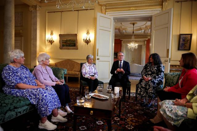Britain's Prime Minister Keir Starmer (C) attends a meeting with campaigners to discuss historical forced adoption, at Downing Street in London on July 2, 2026. (Photo by Isabel Infantes / POOL / AFP)