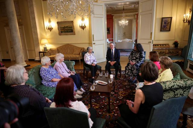 Britain's Prime Minister Keir Starmer (C) attends a meeting with campaigners to discuss historical forced adoption, at Downing Street in London on July 2, 2026. (Photo by Isabel Infantes / POOL / AFP)